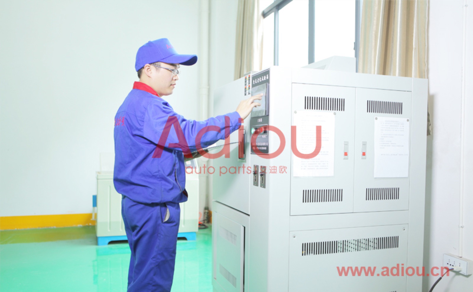 Technician operating a climate test chamber