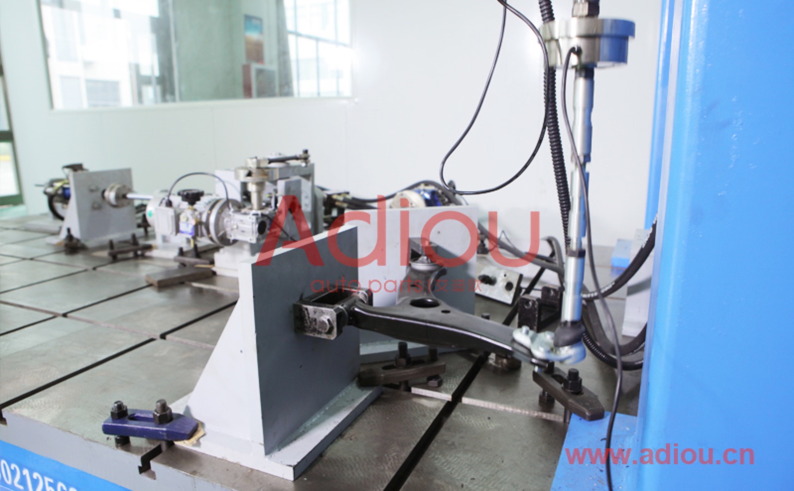 Control arm clamped on a test rig in the Deming laboratory