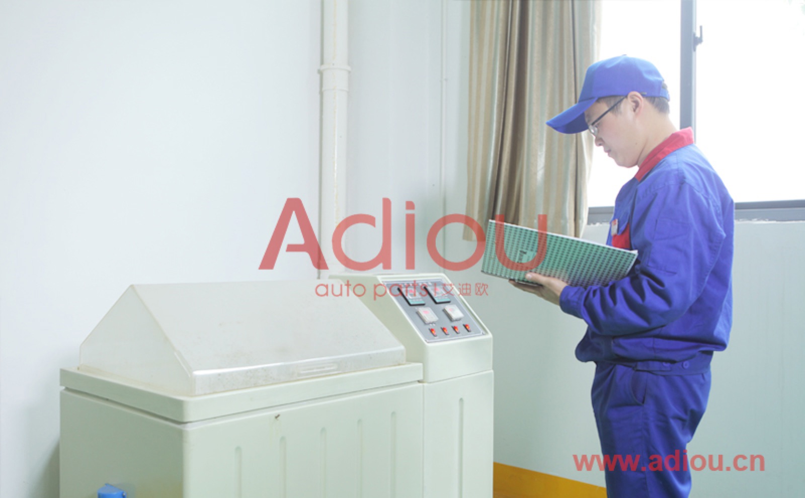 Technician recording results at an environmental test chamber