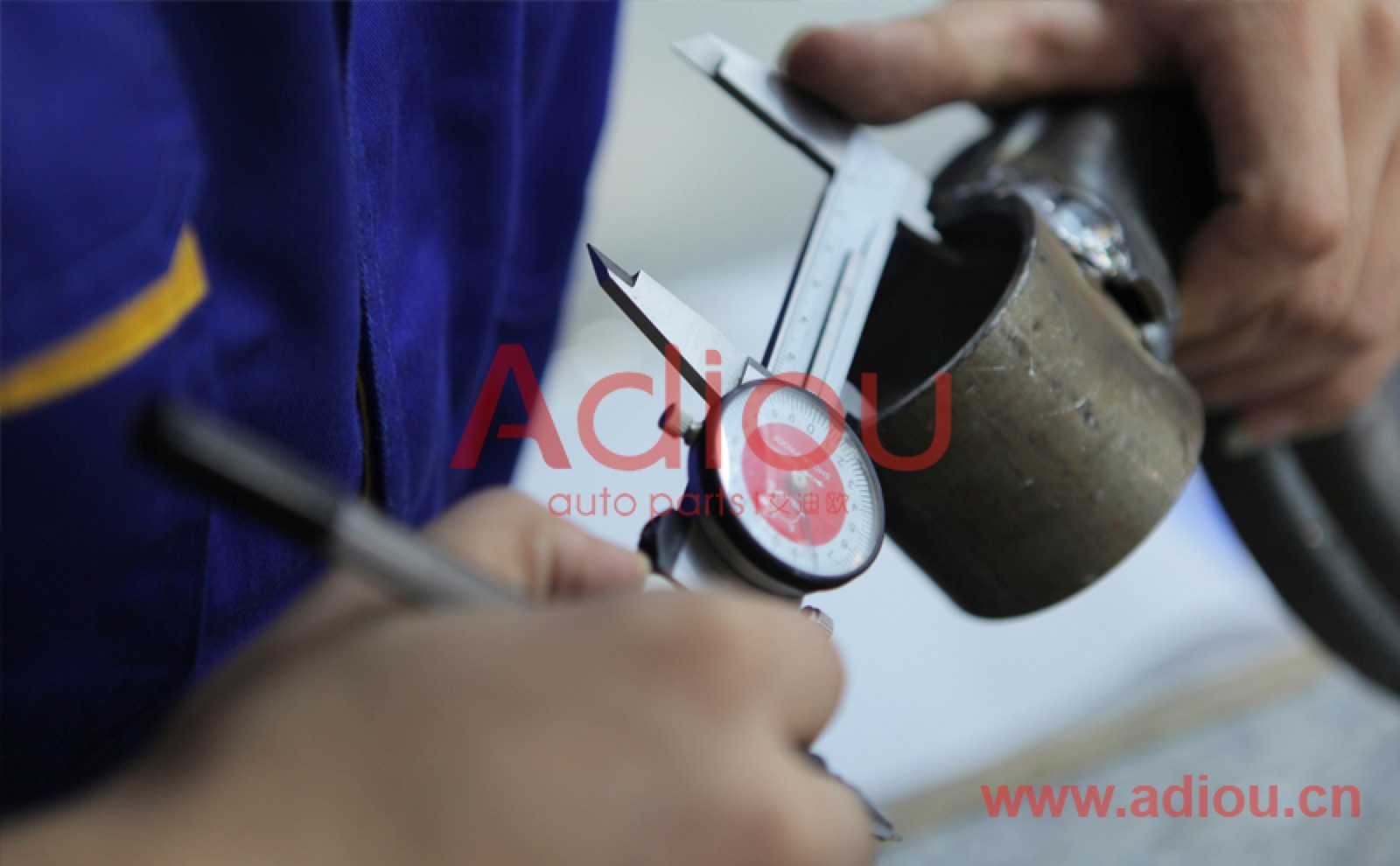 Inspector measuring a part with a gauge